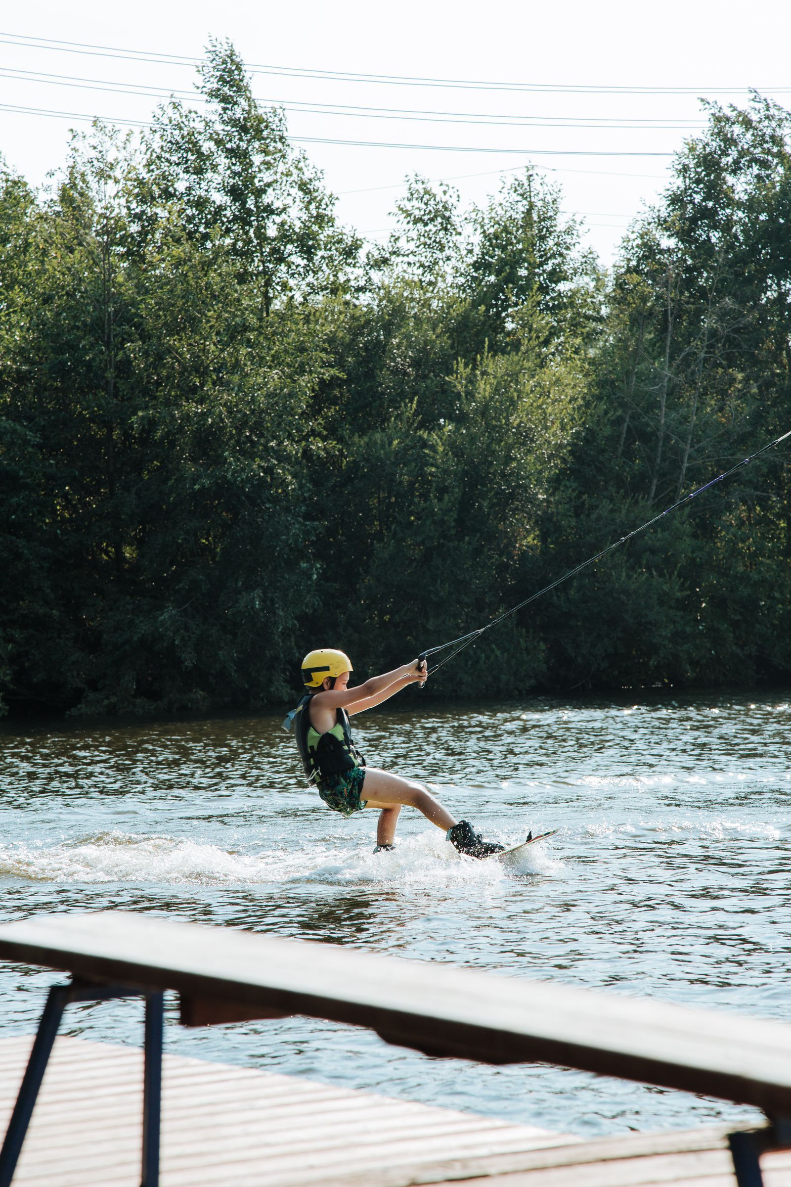 A teen waterskiing